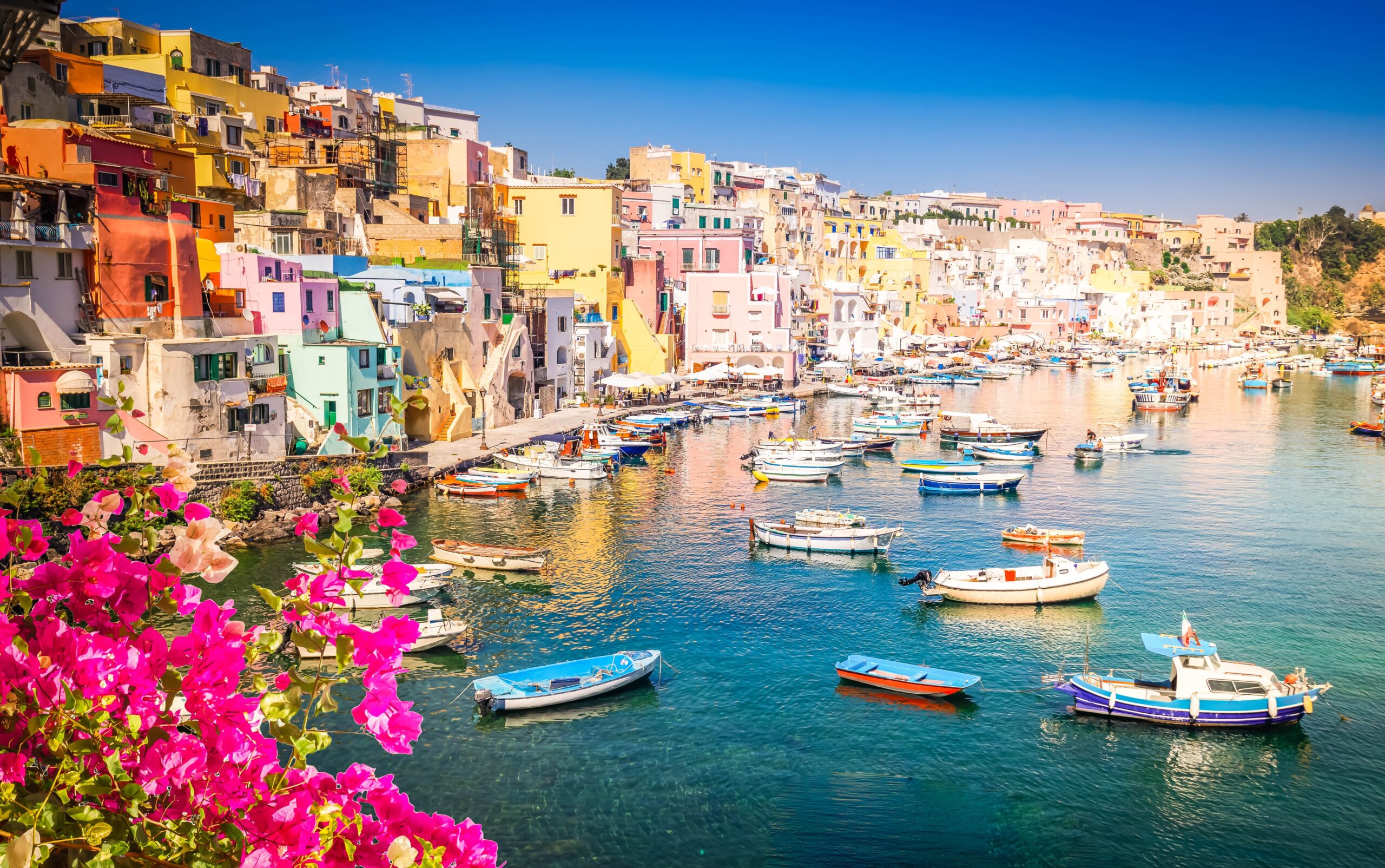 Procida,Island,Colorful,Town,With,Harbor,At,Summer,With,Flowers,