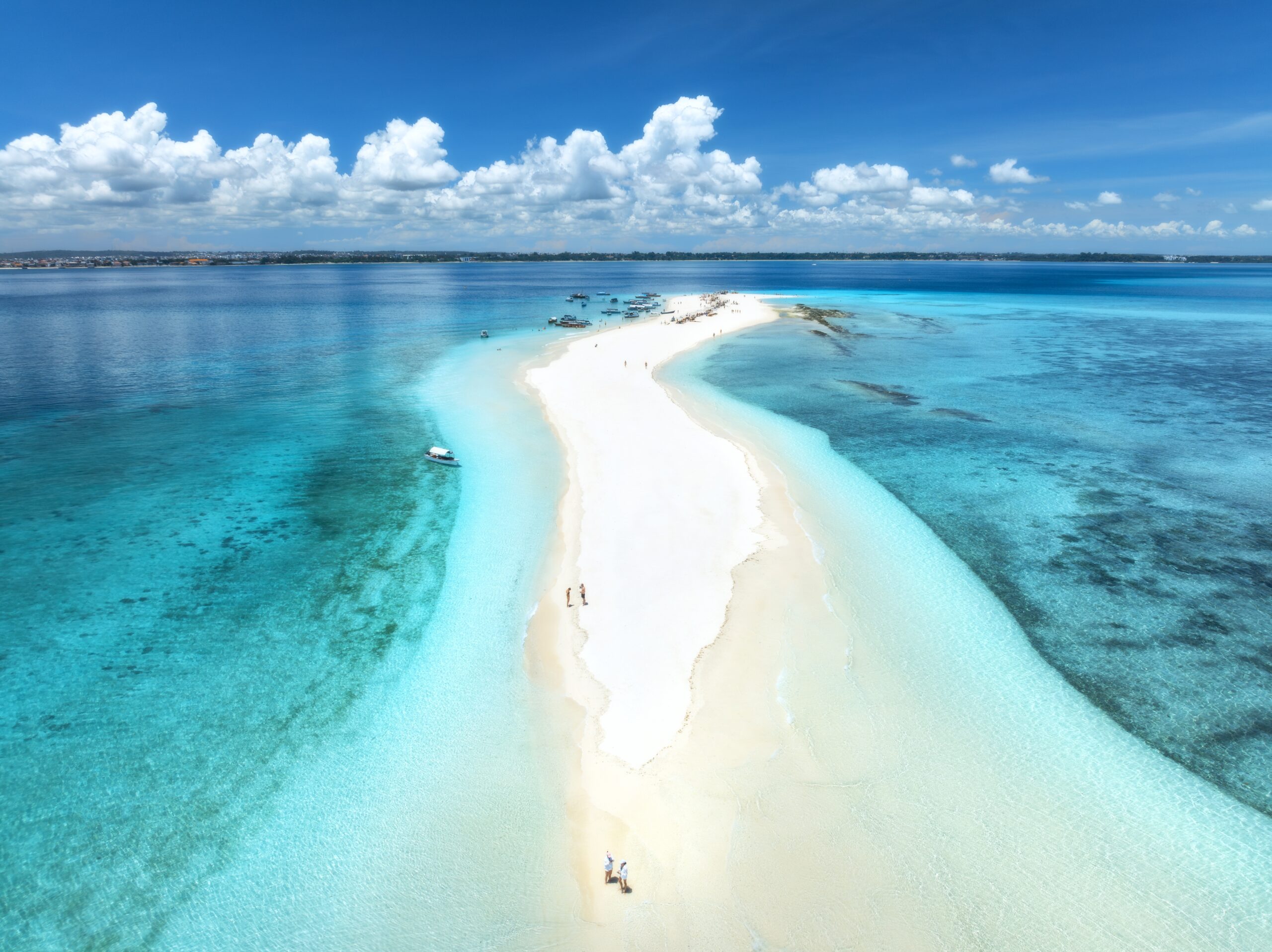 Aerial,View,Of,Nakupenda,Island,,Sandbank,In,Ocean,,Empty,White