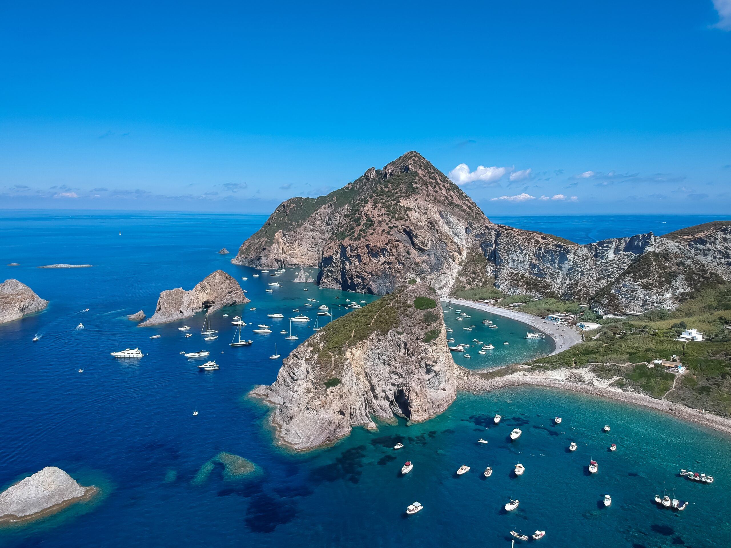 Drone,View,Of,Palmarola,Island,With,Chrystalline,Green,Water,And