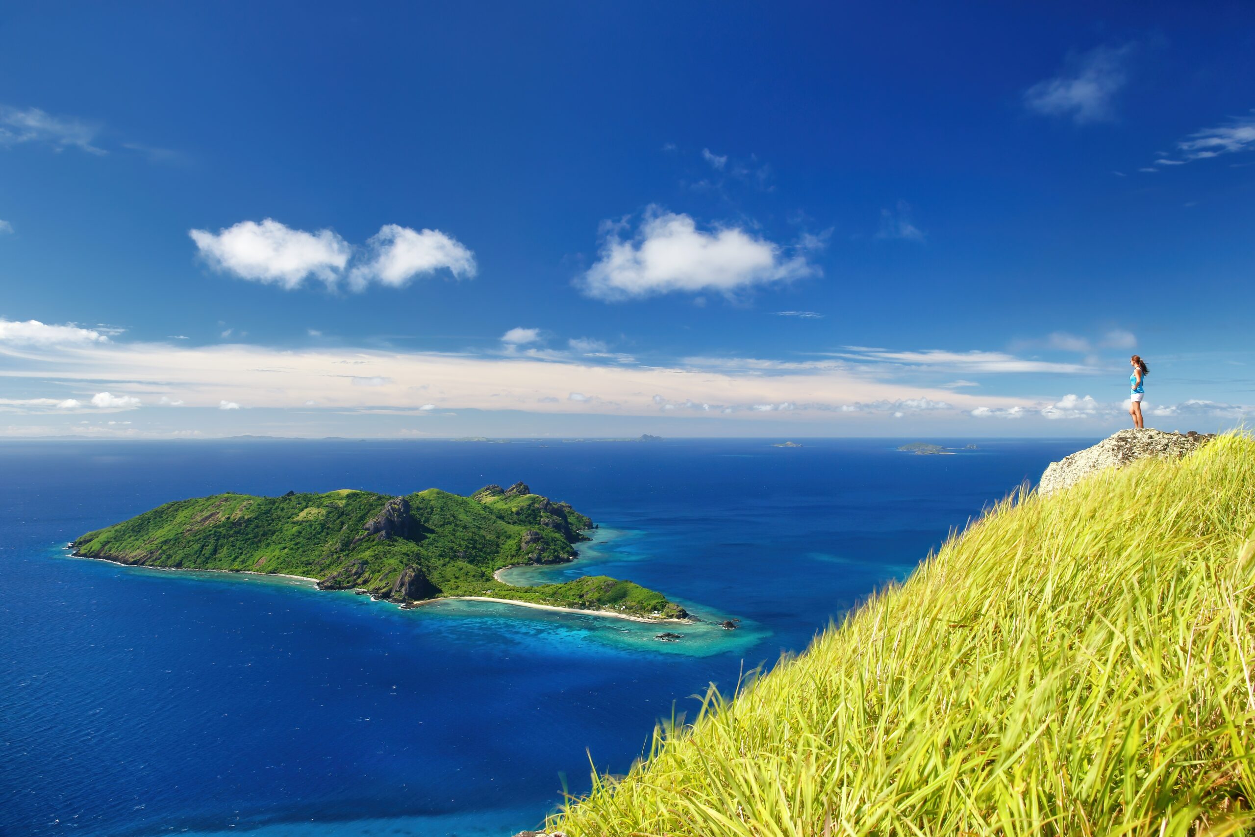 View,Of,Kuata,Island,From,Wayaseva,Island,With,A,Hiker